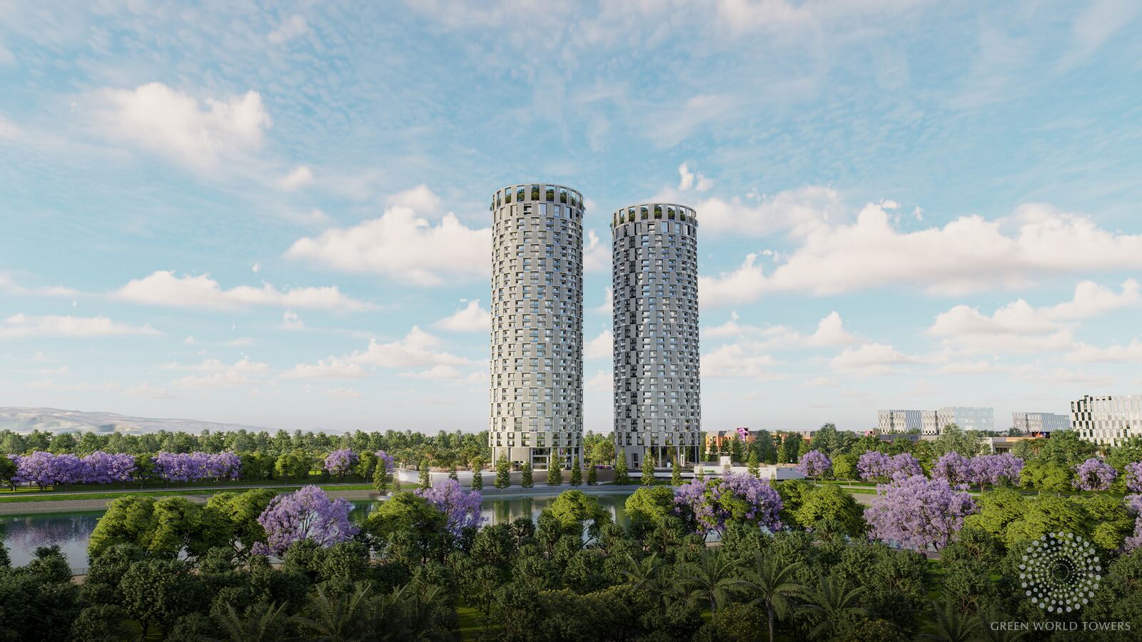 The twin towers above jacaranda trees and the lake
